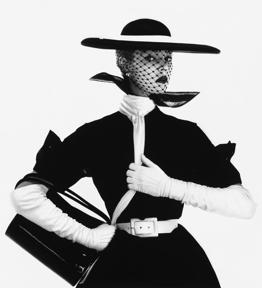 BLACK AND WHITE FASHION WITH HANDBAG, JEAN PATCHETT, NEW YORK (VOGUE USA, APRIL 1950)